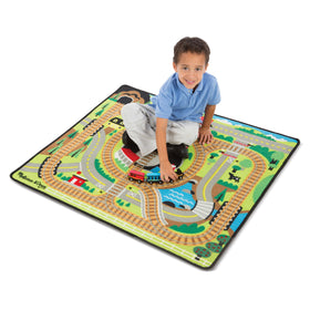 Melissa & Doug Round the Rails rug station detail supports storytelling sessions