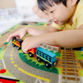 Melissa & Doug Round the Rails Train Cars link together for versatile setups