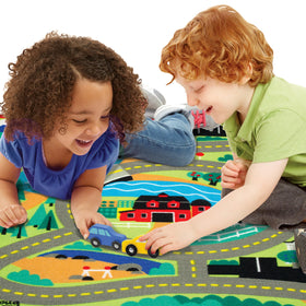Melissa & Doug Round The Town Road Rug school-zone-scene fosters counting and social play