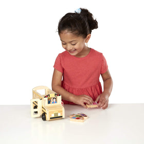 Flip-open stop sign feature in Melissa and Doug bus enhances safe crossing play