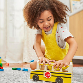 Smooth-rolling wooden wheels provide easy push-along action in Melissa and Doug set