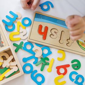 Melissa & Doug See & Spell child-friendly wooden letters spark imaginative word play.
