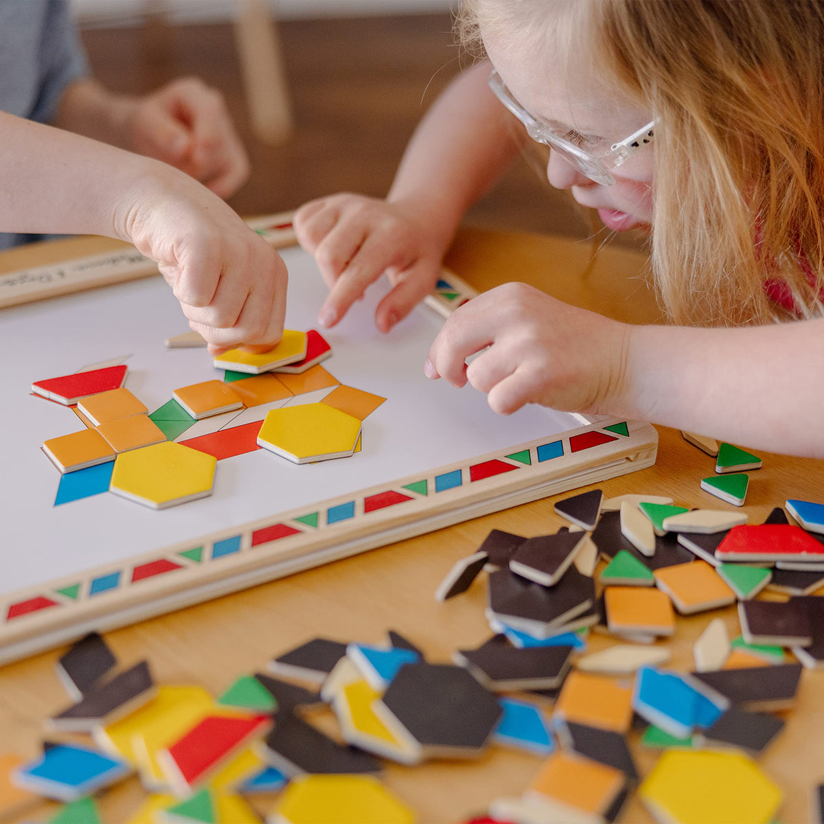 Melissa & Doug magnets help shape and color recognition during play.