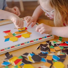 Melissa & Doug magnets help shape and color recognition during play.