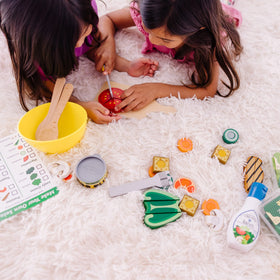 Melissa & Doug Slice & Toss Salad toppings such as olives and croutons