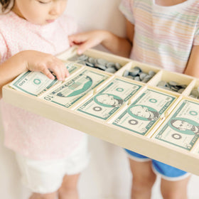 Melissa & Doug sorting and making change encourages hands-on problem solving.