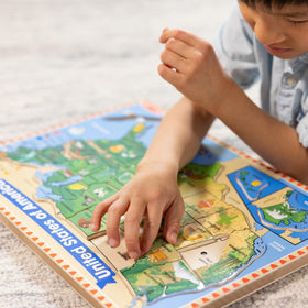 Melissa & Doug state border outlines appear under pieces for reference.