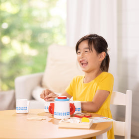 Melissa & Doug cookies add a tasty prop for complete tea-time pretend play.