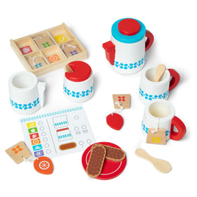 Melissa & Doug tea set milk pitcher for serving pretend guests.