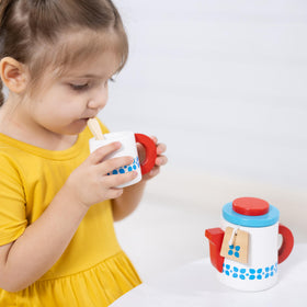 Melissa & Doug spoons for stirring and serving during a pretend tea party.