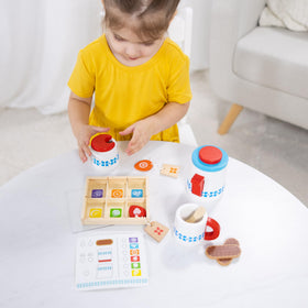 Melissa & Doug tea caddy stores tea bags and keeps play organized.