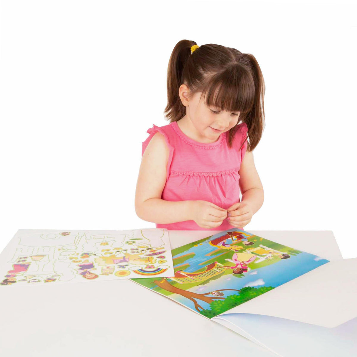 Tear-out pages from Melissa & Doug sticker pad for easy sharing and display