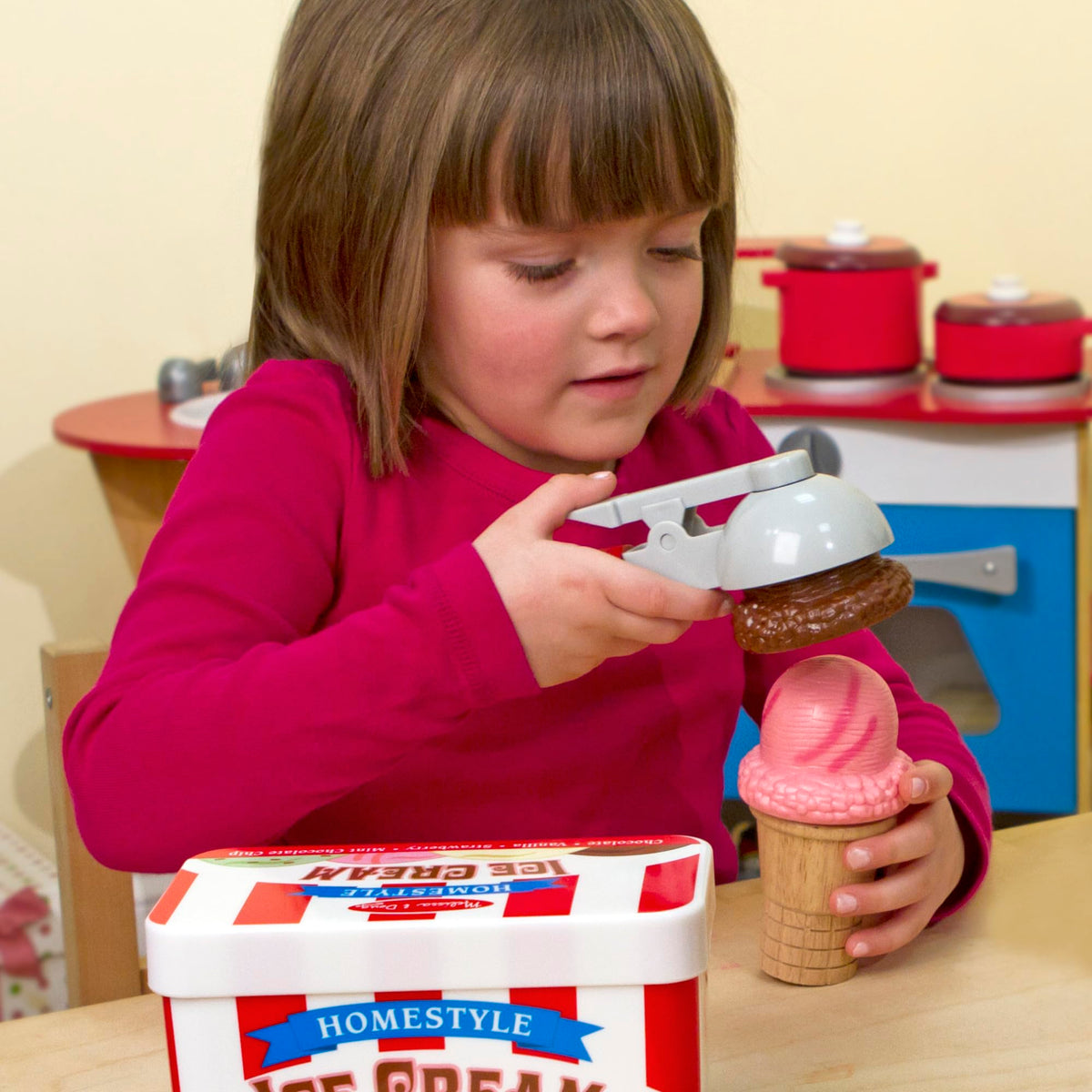 Melissa & Doug sturdy storage tub keeps play pieces organized.