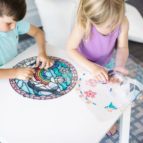 Melissa & Doug sunlit stained-glass dolphins shimmer in bright light