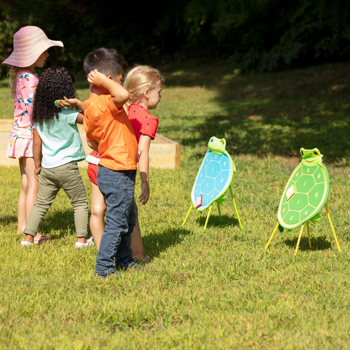 Outdoor setup showing portable play with Melissa & Doug Sunny Patch Dilly Dally Turtle Target Action Game