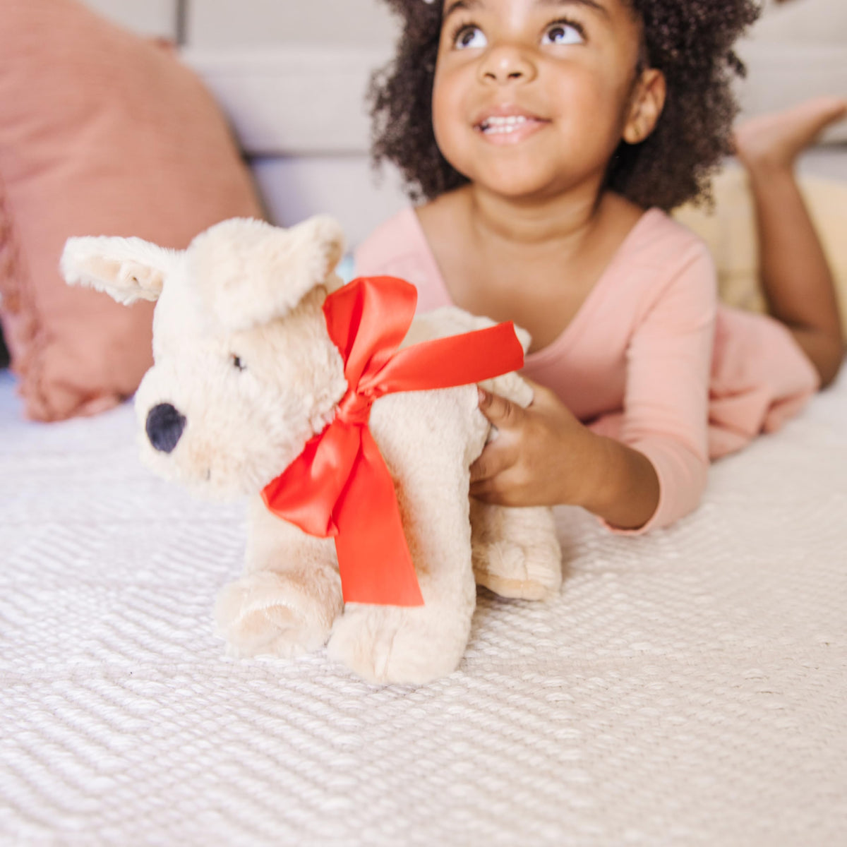 Soft snuggly body invites comforting hugs during reading time.