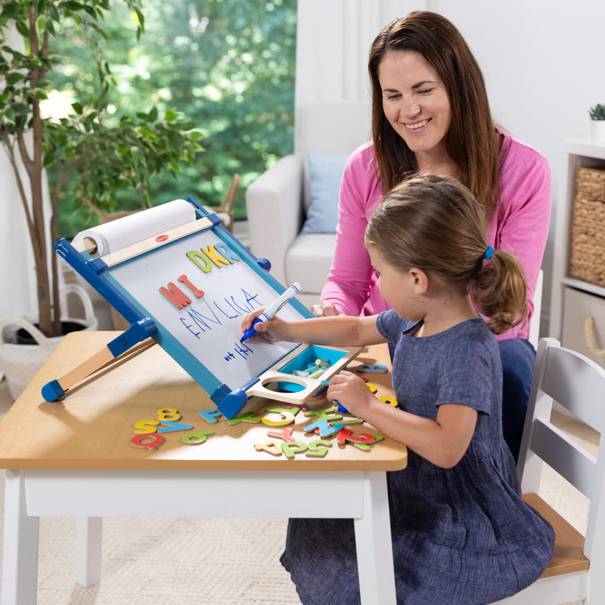Melissa & Doug art supplies keep kids engaged with markers, chalk, eraser, magnets, and tray