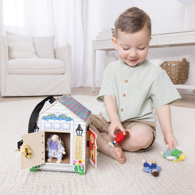 Melissa and Doug Take-Along Doorbell Dollhouse doorbells side view with bells