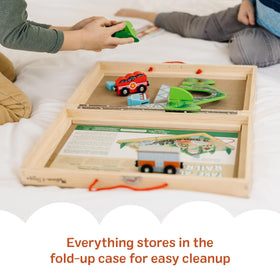 Melissa & Doug Take-Along Railroad illustrated play surface fuels storytelling adventures.