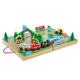 Melissa & Doug Take-Along Railroad open case for portable play and storage.