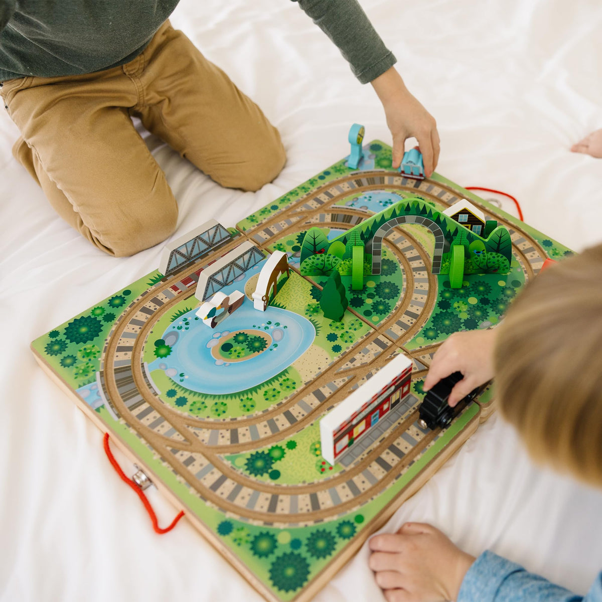 Melissa & Doug Take-Along Railroad sturdy wooden construction withstands daily use.