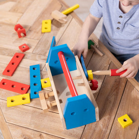 Melissa & Doug wooden nails and screws encourage counting and fine motor skills.