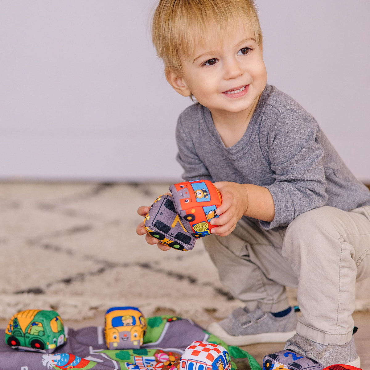 Melissa & Doug Take-Along Town Play Mat durable fabrics are easy to wipe clean.