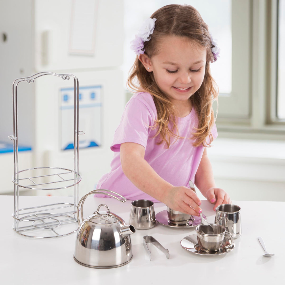 Melissa & Doug tea set two cups for shared pretend tea parties.