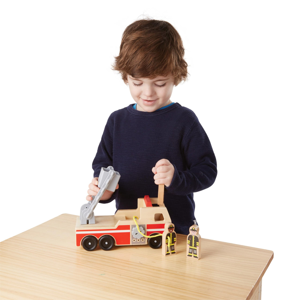 Three Melissa & Doug firefighter figures ready for action