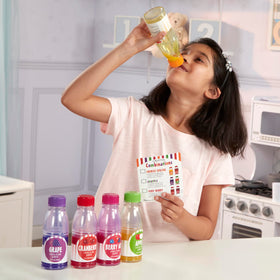 Melissa & Doug Tip & Sip berry mix bottle pour promotes sensory play and recipe ideas.