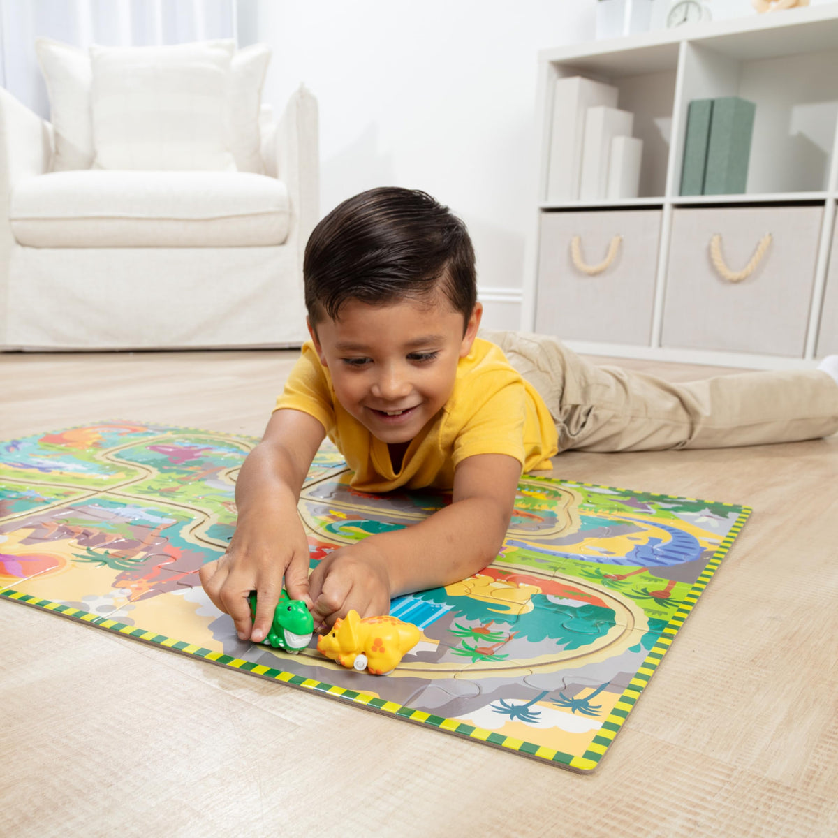 Melissa & Doug track grooves guiding dinosaurs during pretend chase