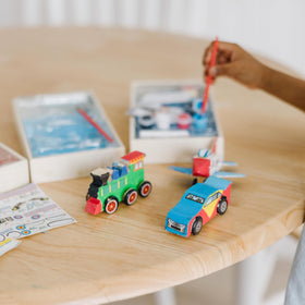 Melissa & Doug train kit with wheels invites hands-on play and learning.
