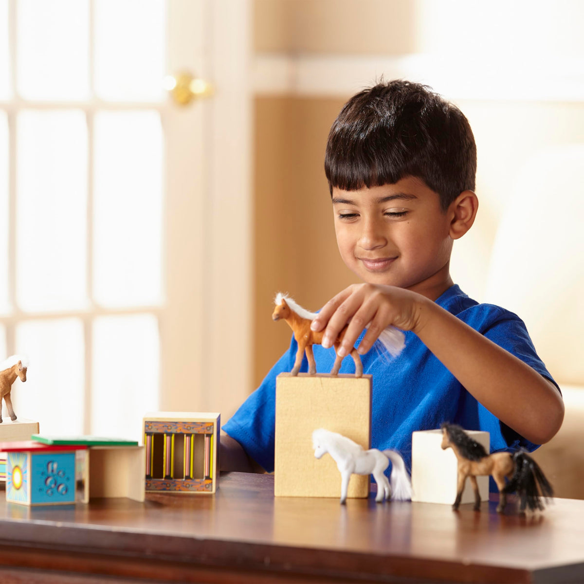 Melissa & Doug truck and trailer hitch creates cohesive pretend trips.