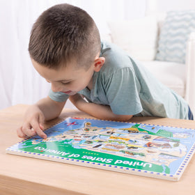 Tabletop play with Melissa & Doug map puzzle offers screen-free learning.