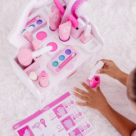 Melissa & Doug vanity mirror with storage drawer supports organized, screen-free play sessions.