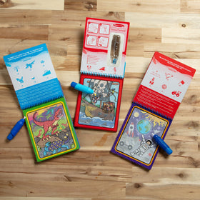 Melissa & Doug Water Wow kid hands enjoy easy, mess-free play.