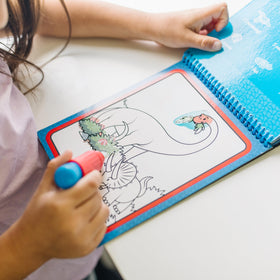 Melissa & Doug Water Wow pen stored in pad for easy travel and use.