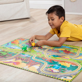 Melissa & Doug wind-up dinos glide on the track for imaginative play