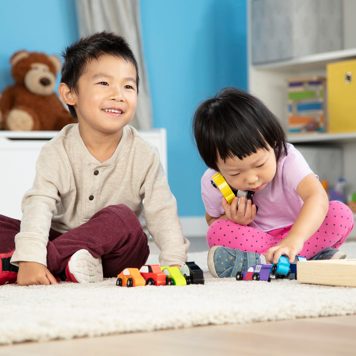 The Melissa & Doug tray keeps all nine cars neatly stored.