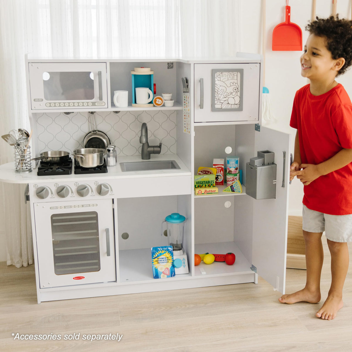 Melissa & Doug wooden chef’s kitchen spacious area for multiple kids to play.
