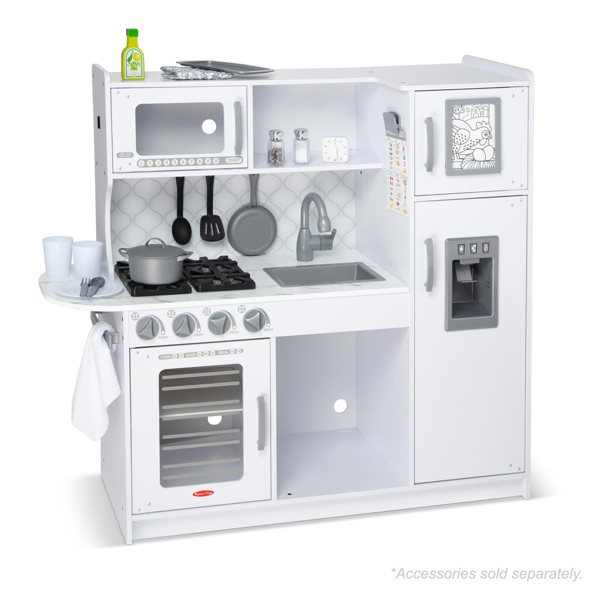 Melissa & Doug wooden chef’s kitchen microwave with turning plate for interactive play.