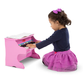 Melissa & Doug wooden piano designed for durable, safe play.