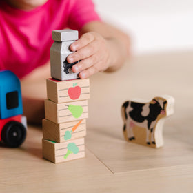 Melissa & Doug wooden farm train colorful engine detail—bright hues spark curiosity.