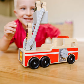 Melissa & Doug fire truck ladder in action for rescue role-play