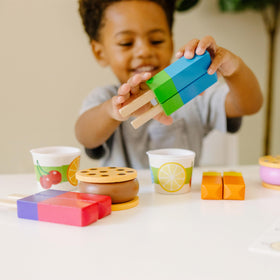 Six cookies with fillings support sorting and counting practice.