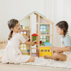 Melissa & Doug hi-rise dollhouse in 1:12 scale with compatible dolls