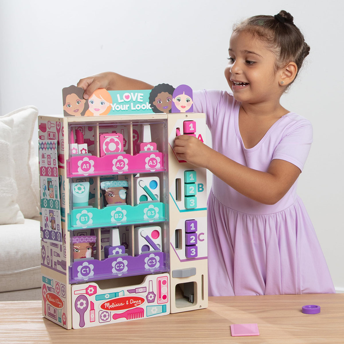 Melissa & Doug FSC-certified wooden kiosk demonstrates durable, eco-friendly pretend play