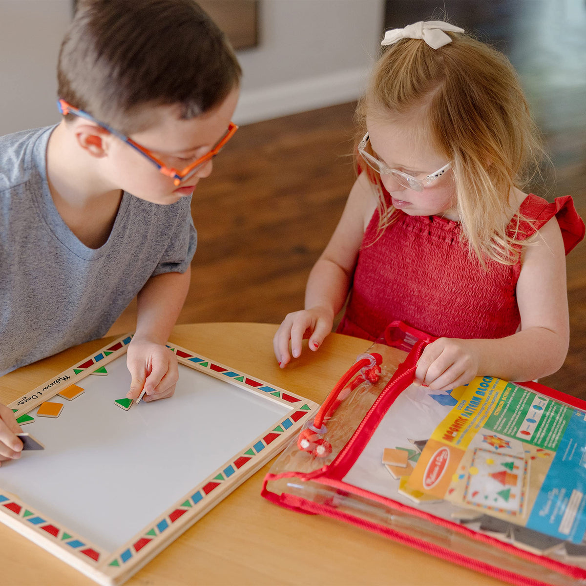Melissa & Doug wooden magnetic play board provides sturdy storage.