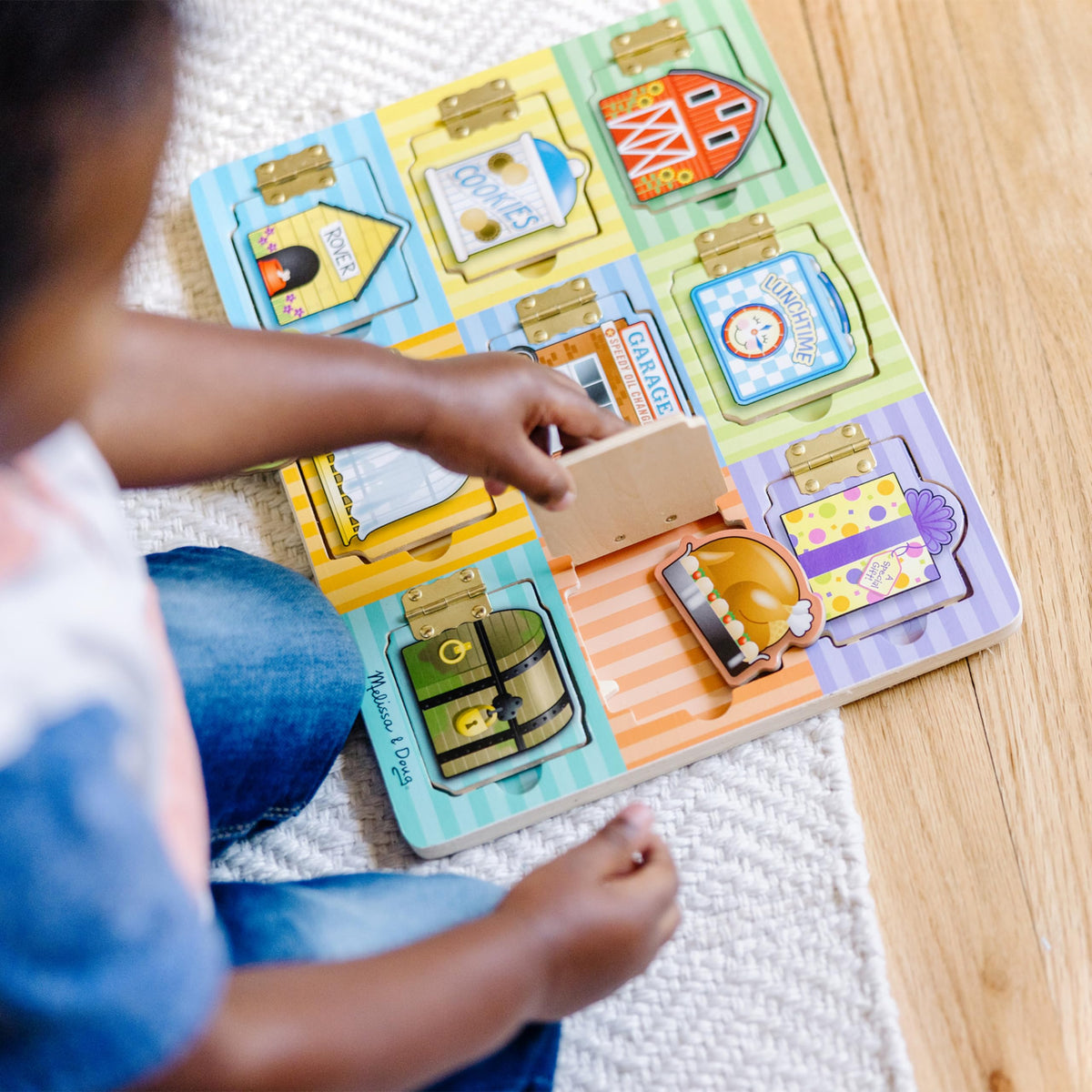 Wooden-magnetic puzzles behind doors promote fine motor skills