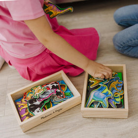 Melissa & Doug wooden magnets include 20 animal magnets for diverse storytelling.